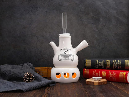 Ye Olde Bells vocal steamer for singers: a Victorian-style ceramic steam inhaler on a wooden desk